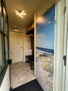 Eingang - Technikschrank und Garderobe